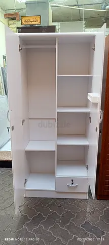 We are selling double door wood Cupboard brand new
