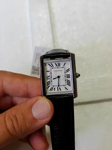 Men watch Cartier