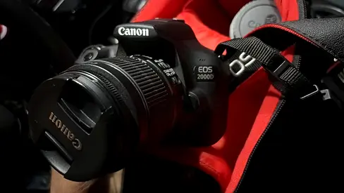 Canon EOS 2000D DSLR W/Bag, 2x batteries+charger, EFS Canon 18-55mm  55-250mm telescopic lenses.