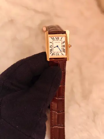 Men watch Cartier