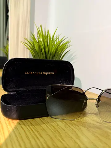 Stylish Alexander McQueen Sunglasses with Case. Never used. Full silver with Swarovski skull