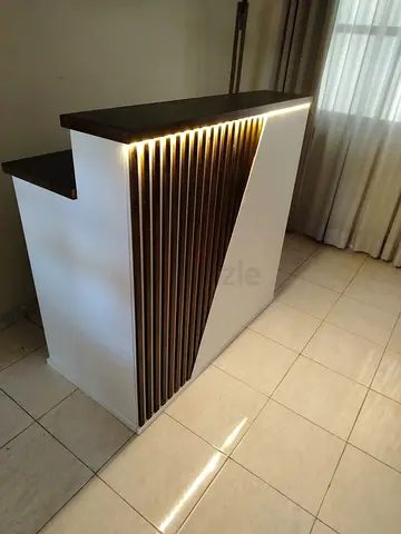 Custom Wood reception Table with Central Column wood penels