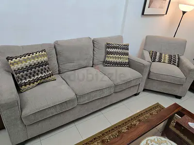 Comfortable Grey Sofa with Cushions