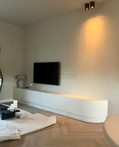 Modern Wall-Mounted TV Console with Fluted Front and Minimalist Design