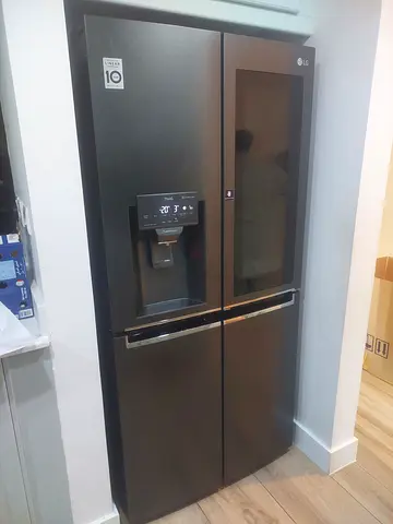 Stylish LG French Door Refrigerator with Water Dispenser