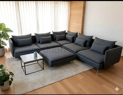 Luxury Corner Sofa with matching center ottoman. Soft cushions, strong base and contemporary design