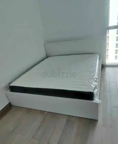 IKEA malam king‑size bed (180 × 200 cm) with 2 storage drawers underneath and an IKEA mattress