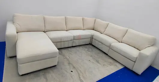 Pottery barn beige color Ushape sofa with storage