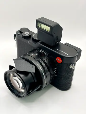 Leica D-LUX 8 with accessories.