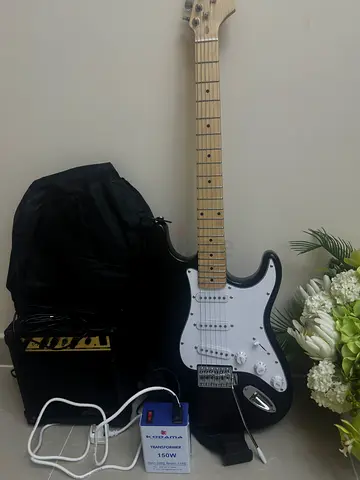 Black Electric Guitar with Amplifier