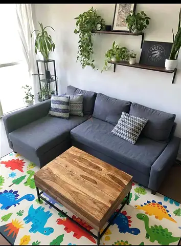 Modern IKEA sofa bed with spacious storage compartment. Brand  and ideal for maximizing space withou