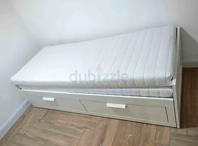 Ikea brimness Day bed frame with 2 big storage drawers underneath and with 2 Ikea mattresses is