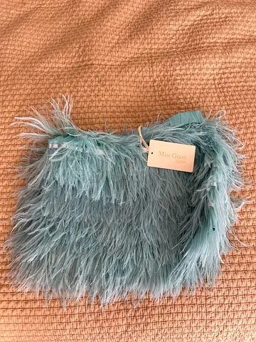 Women feather skirts Miss Grant Cotture