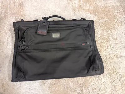 Tumi black garment bag.