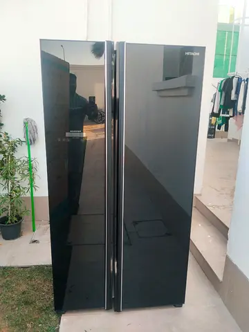 Hitachi black side by side fridge 2400 AED good condition super working