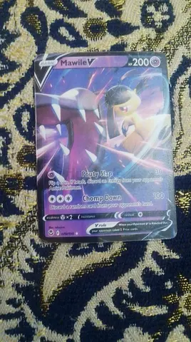 Pokemon cards  if you give me one dirham I will give you two cards