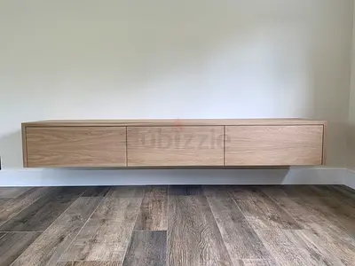 Custom MDF Floating TV Console with Elegant Curved Edges and Fluted Front Detail