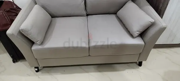 Comfortable Grey Sofa with Cushions