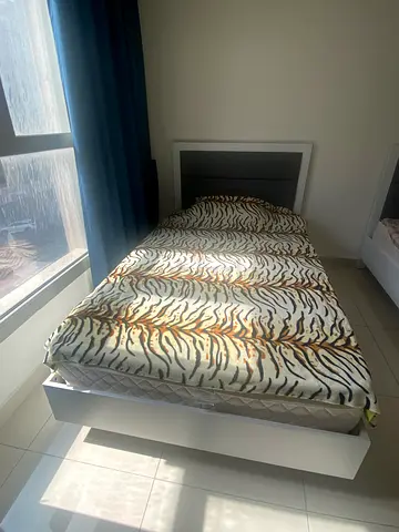 Single bed and mattress