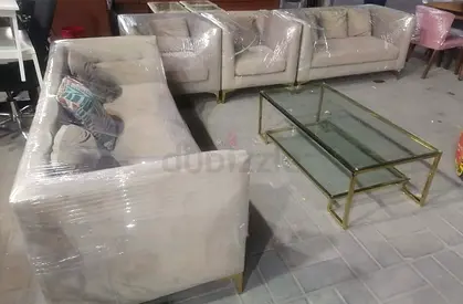 Elegant Beige Sofa Set with Glass Coffee Table