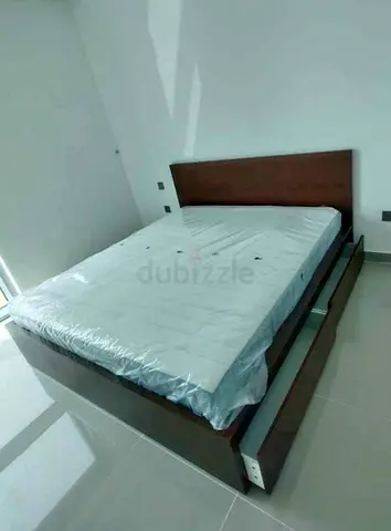 IKEA malam king‑size bed (180 × 200 cm) with 2 storage drawers underneath and an IKEA mattress