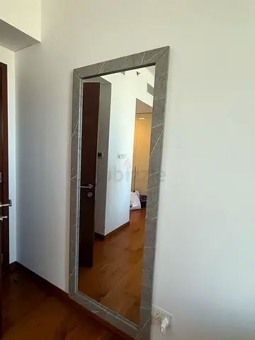 Elegant Full-Length Mirror with Marble Frame effect