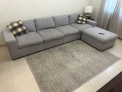 Comfortable Grey Sofa with Ottoman
