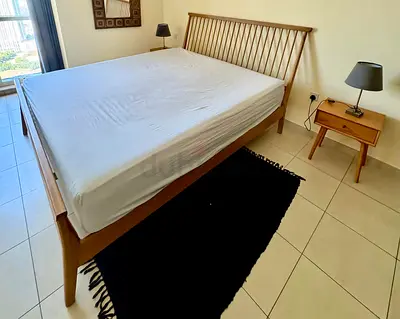 Great Condition Home Center Bed Set With two side tables
