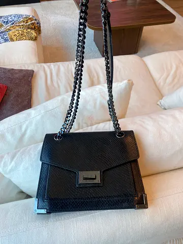 The Kooples Black Leather Chain Bag – AED 180