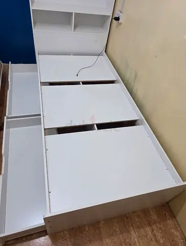 Spacious White Bed with Storage