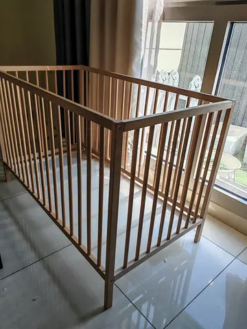 Ikea Wooden Crib for Sale with matress and bumper and cover sheets
