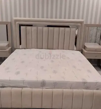 Queen size fabric bed with tufted headboard