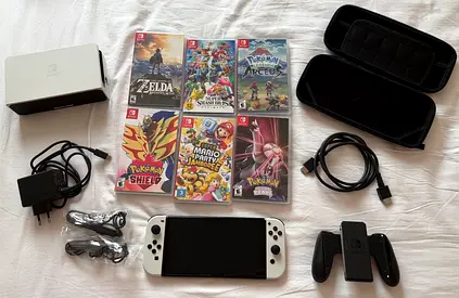 Nintendo Switch OLED with Games and accessories