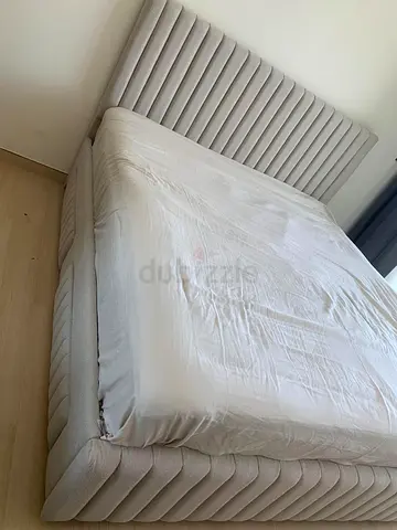 Stylish Modern Bed with Plush Fabric and Headboard