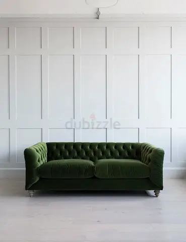Button tufted soft green velvet sofa