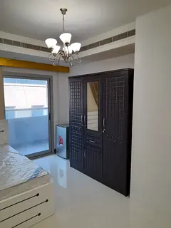 Room is available for single male and female executives in Al Mina area