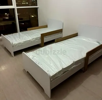 Modern Twin Beds with Wooden Accents