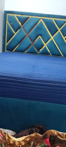 Modern Blue Bed Frame with Unique Design