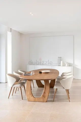 Designer Oval Dining Table with Vertical Groove Pedestal Legs