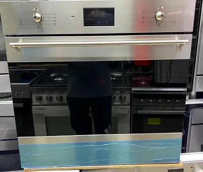 Smeg 60cm built in  electric oven and microwave set