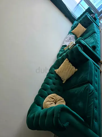 Elegant Green Velvet Sofas with Cushions
