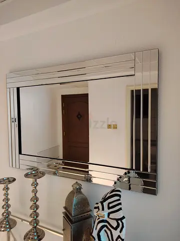 Elegant Mirror with its table Modern Design and coffee table all glass and chrome from pan emirates