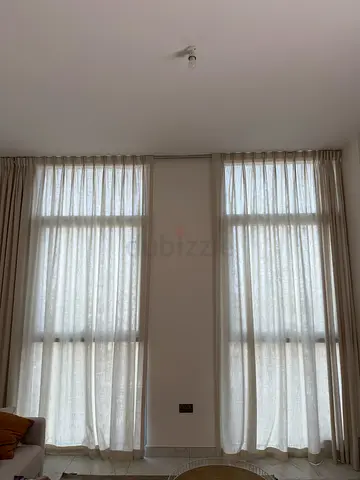 Custom made curtains with trail and tieback