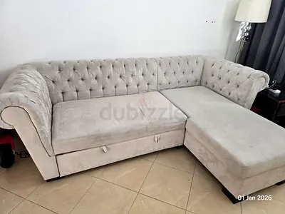 Sofa with futon storage in both
