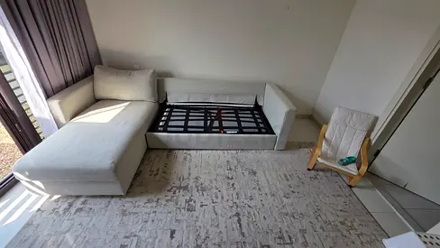 In super great condition vimle shape sofa bed beige