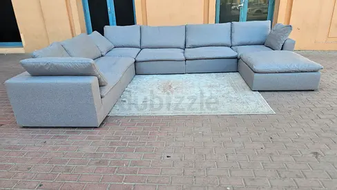The one Modular feather filled sofa with footstool