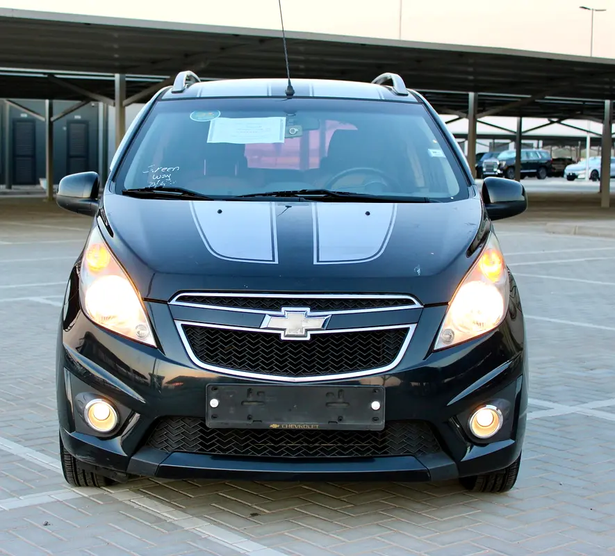Chevrolet Spark 2012 — photo 1 of 12