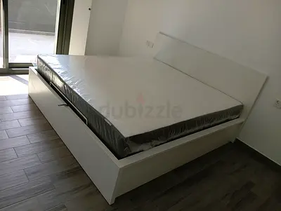 Ikea hydraulic king size bed frame with storage inside full bed and with Ikea pocket sprung  mattres