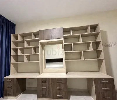 Custom built-in study desk with shelving