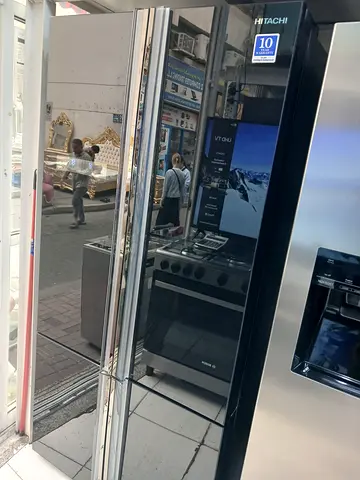 Hitachi brand 4 door  fridge like new condition